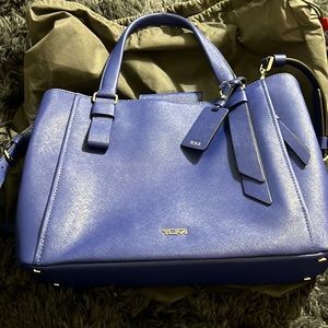 A brand new Tumi shoulder bag!